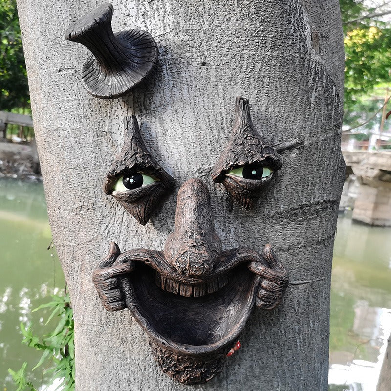 Radiant bark monster face bird feeder manual facial resin ornament